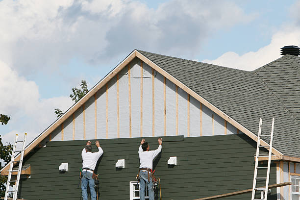 Professional Siding Contractor technician working in Huntington, NY